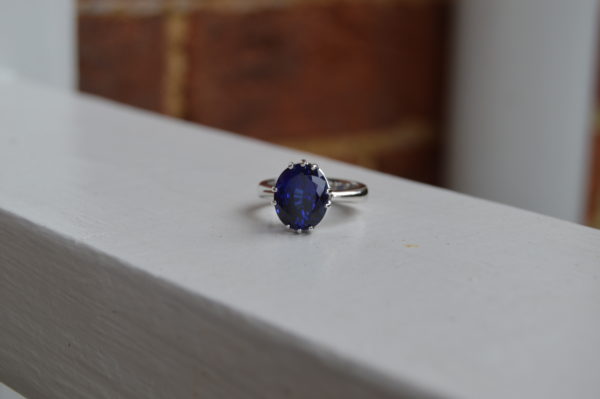 Lady's oval sapphire ring in simple prong setting