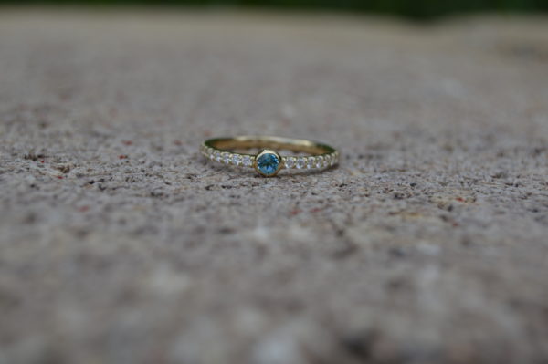 Blue topaz and diamond wedding/stackable band in yellow gold