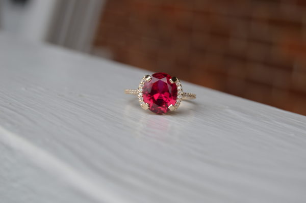 Custom Designed Oval Ruby and Diamond Ring in Yellow Gold