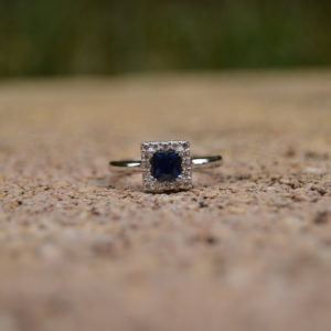 Custom Designed Round Sapphire and Diamond Halo Ring in White Gold