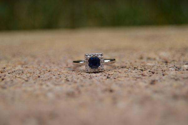 Custom Designed Round Sapphire and Diamond Halo Ring in White Gold