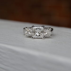 Custom Designed Three Diamond Ring with Three Princess Cuts