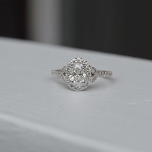 Custom Designed Engagement Ring - Oval Diamond Halo with Leaf Design and Diamond Band