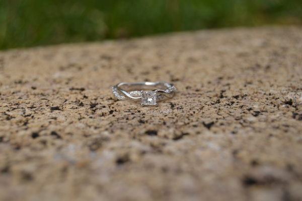 Custom Designed Engagement Ring with Twist Shank and Princess Cut Center Diamond