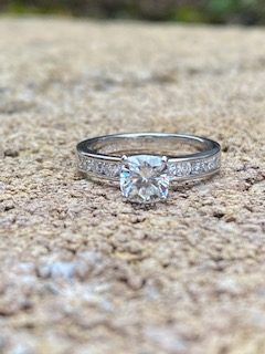 Custom Designed Engagement Ring with Round Center and Channel Set Shank