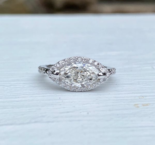 Custom Designed Marquise Diamond Halo Ring with Ideal Cut Round Diamonds
