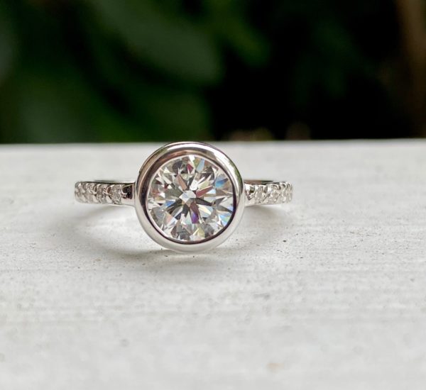 Custom Designed Diamond Engagement Ring with Round Bezel Set Center and Shared Prong Shank with Round Ideal Cut Diamonds