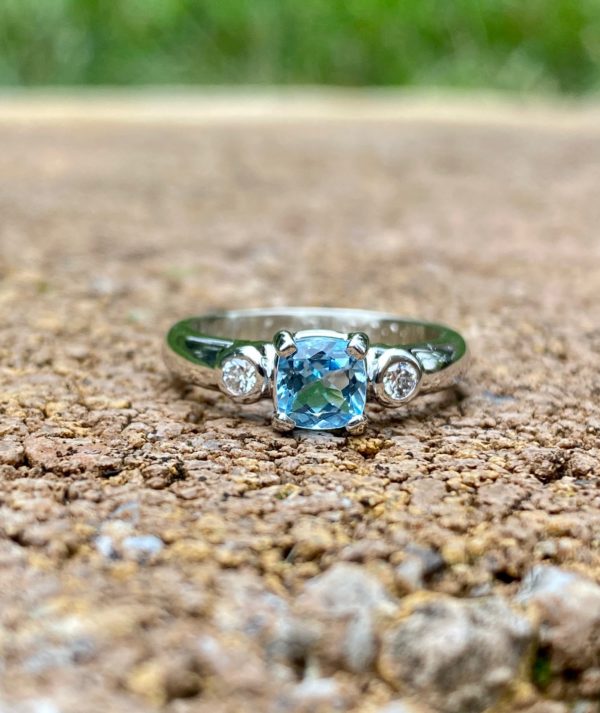 Custom Designed Class Ring Featuring a Cushion Shaped Aquamarine and Round Diamonds