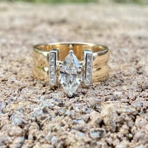 Custom Designed Two Tone Marquise Diamond Ring with Wide Shank and Channel Set Diamond Bars