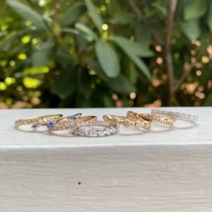 Assorted wedding bands with diamonds and gemstones