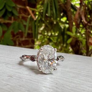 Custom Designed Oval Diamond Engagement Ring with Black Diamonds in Shank