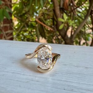 Custom Designed Oval Diamond Swirl Bypass Ring