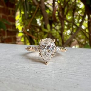 Custom Designed Pear Shaped Diamond Ring with Hidden Halo
